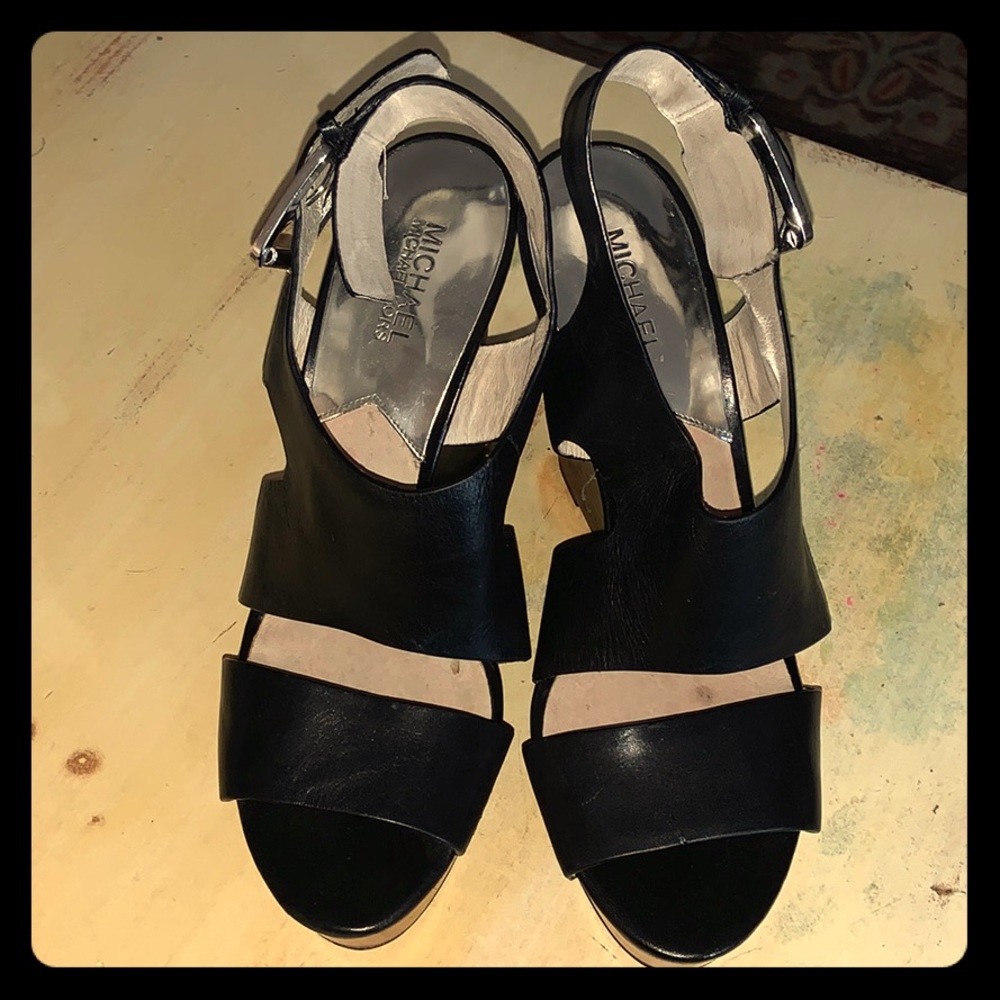 Michael Kors black platform shoes.